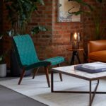 RISOM LOUNGE CHAIR by JENS RISOM, designed in 1943. JENS RISOM‚Äôs furniture, the first collection designed for and manufactured by KNOLL, helped establish the company as an early provider of modern design in America. THE LOUNGE CHAIR's combination of gentle curves and geometric angles exhibit RISOM‚Äôs Scandinavian design sensibilities.