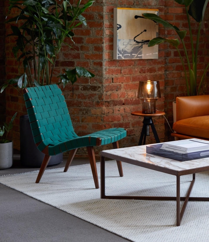 RISOM LOUNGE CHAIR by JENS RISOM, designed in 1943. JENS RISOM‚Äôs furniture, the first collection designed for and manufactured by KNOLL, helped establish the company as an early provider of modern design in America. THE LOUNGE CHAIR's combination of gentle curves and geometric angles exhibit RISOM‚Äôs Scandinavian design sensibilities.