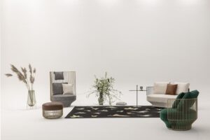 PARADISE BIRD SOFA by LUCA NICHETTO, designed in 2020. PARADISE BIRD is a collection of unusual pieces of furniture: it manifests an attitude to life, an exciting interplay of freedom and retreat, openness and reassurance. In balance between shape and essence, through a bold design that merges elegance and flexibility, PARADISE BIRD is rooted into the Viennese tradition of sophistication. The family composed of a lounge chair, a high back chair, a two-seater sofa and a stool transcribes the eclecticism of a research that aims to enhance the comfort. The special seating experience may be a surprise in view of the idiosyncratic shapes, but pocket springs and down filling deliver the kind of seating comfort associated with a genuine WITTMANN.