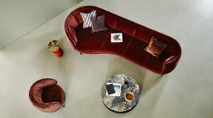 VUELTA LOUNGE SOFA By JAIME HAYON. If the brief was to create furniture to counteract boredom, then it‚Äôs safe to say mission accomplished. JAIME HAYON‚Äôs collection for WITTMANN truly brings colour into the picture, in every respect. VUELTA LOUNGE is no exception: the sofa features the generous, perfectly upholstered curve of the VUELTA CHAISELONGUE ‚Äì positioned left or right according to preference ‚Äì while on the other side it demonstrates its qualities as a chair, without foregoing the characteristic curved armrest. VUELTA LOUNGE makes the VUELTA family into a group of elements that ‚Äì typically for HAYON ‚Äì has significantly more refinement and self-confidence than is found in other pieces of this kind.