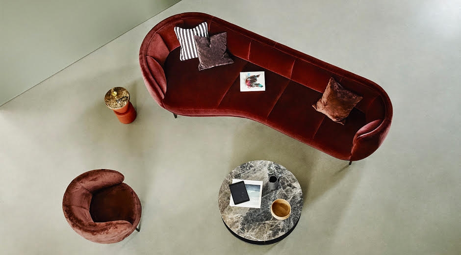 VUELTA LOUNGE SOFA By JAIME HAYON. If the brief was to create furniture to counteract boredom, then it‚Äôs safe to say mission accomplished. JAIME HAYON‚Äôs collection for WITTMANN truly brings colour into the picture, in every respect. VUELTA LOUNGE is no exception: the sofa features the generous, perfectly upholstered curve of the VUELTA CHAISELONGUE ‚Äì positioned left or right according to preference ‚Äì while on the other side it demonstrates its qualities as a chair, without foregoing the characteristic curved armrest. VUELTA LOUNGE makes the VUELTA family into a group of elements that ‚Äì typically for HAYON ‚Äì has significantly more refinement and self-confidence than is found in other pieces of this kind.