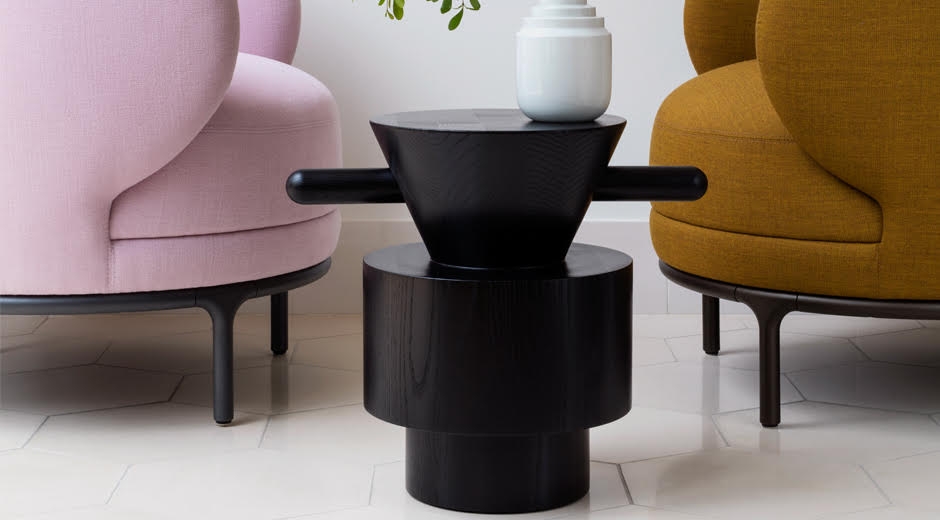 GRAIN CUT TABLE by JAIME HAYON It is a sculpture, or a table ‚Äì elaborately turned from a solid block of wood. As a side table, the GRAIN CUT SIDE TABLE can be placed wherever it is needed due to its flexible handles. It is a shelf for your favourite book or a glass of wine or cup of tea. As a sculpture in the room it attracts attention and sparks discussions about art and design.