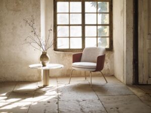 MERWYN lounge chair by SEBASTIAN HERKNER. The shell that SEBASTIAN HERKNER gives this quality core espouses a similar blend of traditional and contemporary strengths: the shape of the chair and sofa stirs up associations with classic armchairs and canap√©s. The precise upholstery is positioned above delicate, almost fragile-looking legs. By contrast, the piece‚Äôs modern, pared-down shape and thoroughly stable structure ‚Äì along with its pleasingly coherent proportions ‚Äì is a product of the complexity of knowledge and skill that goes into innovative design ideas.