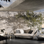 LIDO CORD OUTDOOR by GAMFRATESI, designed in 2022.LIDO CORD OUTDOOR is comprised of a sofa, armchair, footstool, dining and lounge little armchairs, all with an enveloping design that conveys the idea of a comfortable nest.